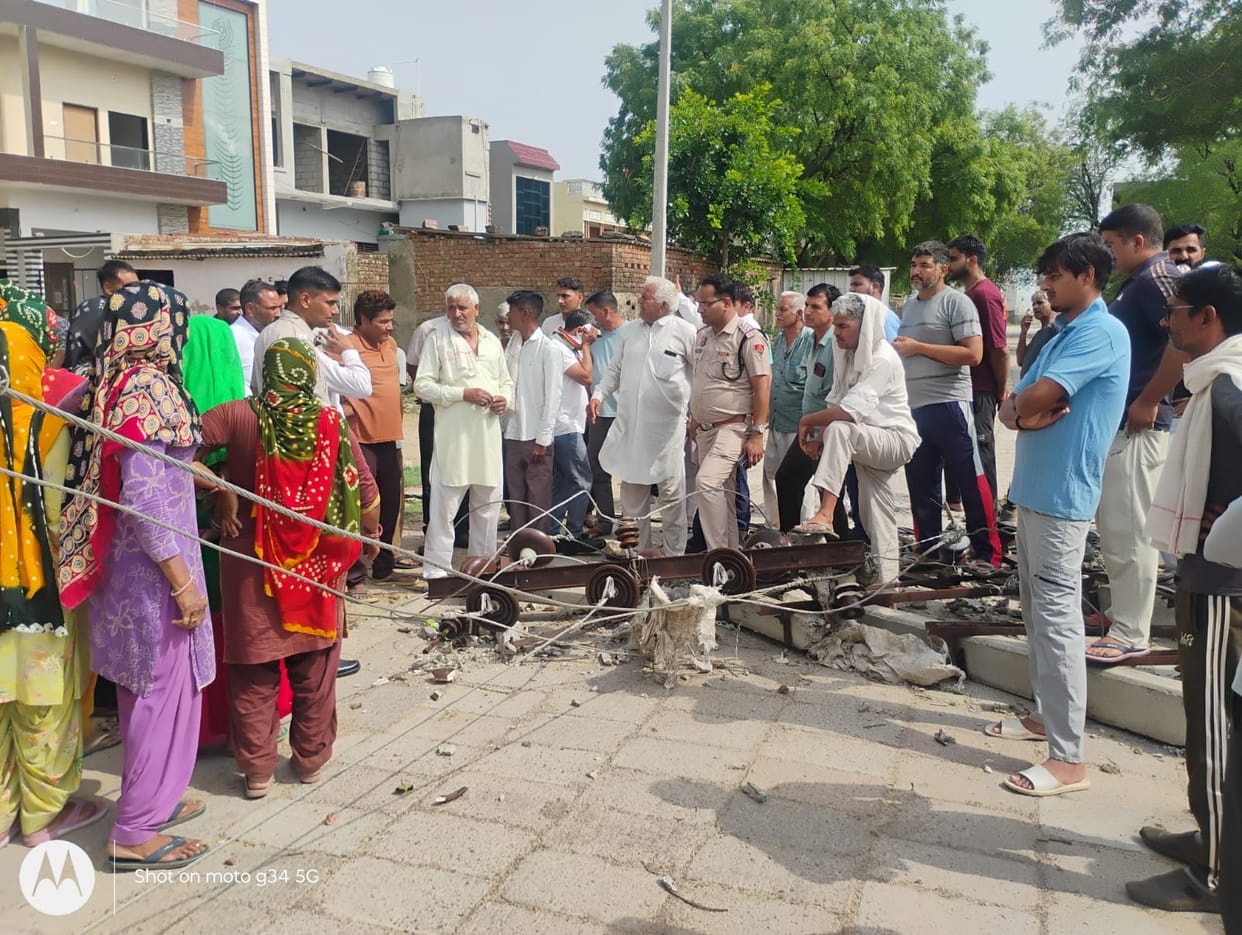 Villagers outraged over power and water crisis; block Bawal-Pranpura Road.