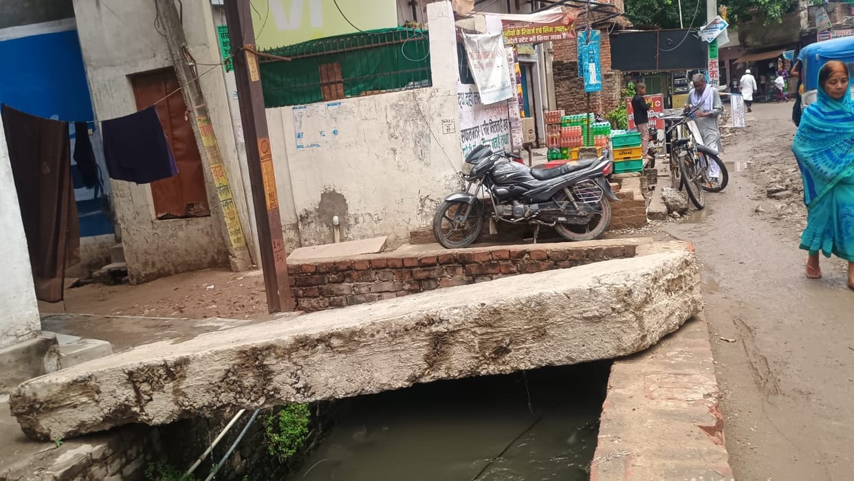 Encroachment by shops and houses over drains is the cause of waterlogging.