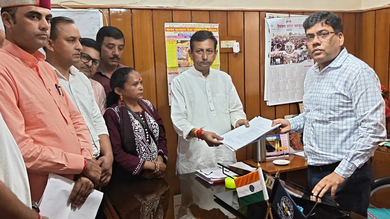 Villagers launch a protest against the merger of schools.