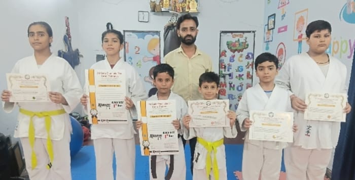 Aarav and Toshika achieved their black belts.