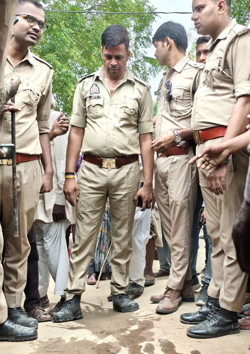 Six-hour uproar over demand to bury the body at the murder site.