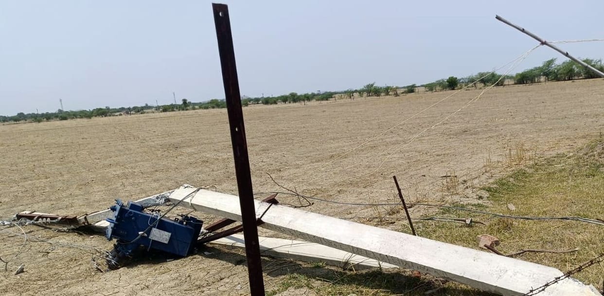 The storm caused the collapse of power poles at two locations, disrupting power supply.