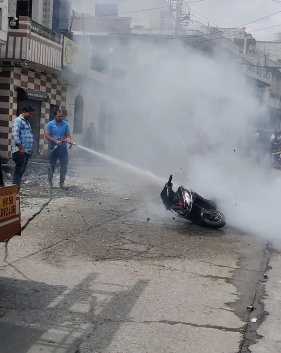 Electric scooter burst into flames with a loud bang