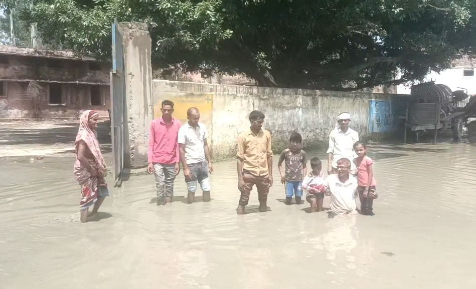 Waterlogging at the block gate; frustrated residents staged a protest while standing in the dirty water.