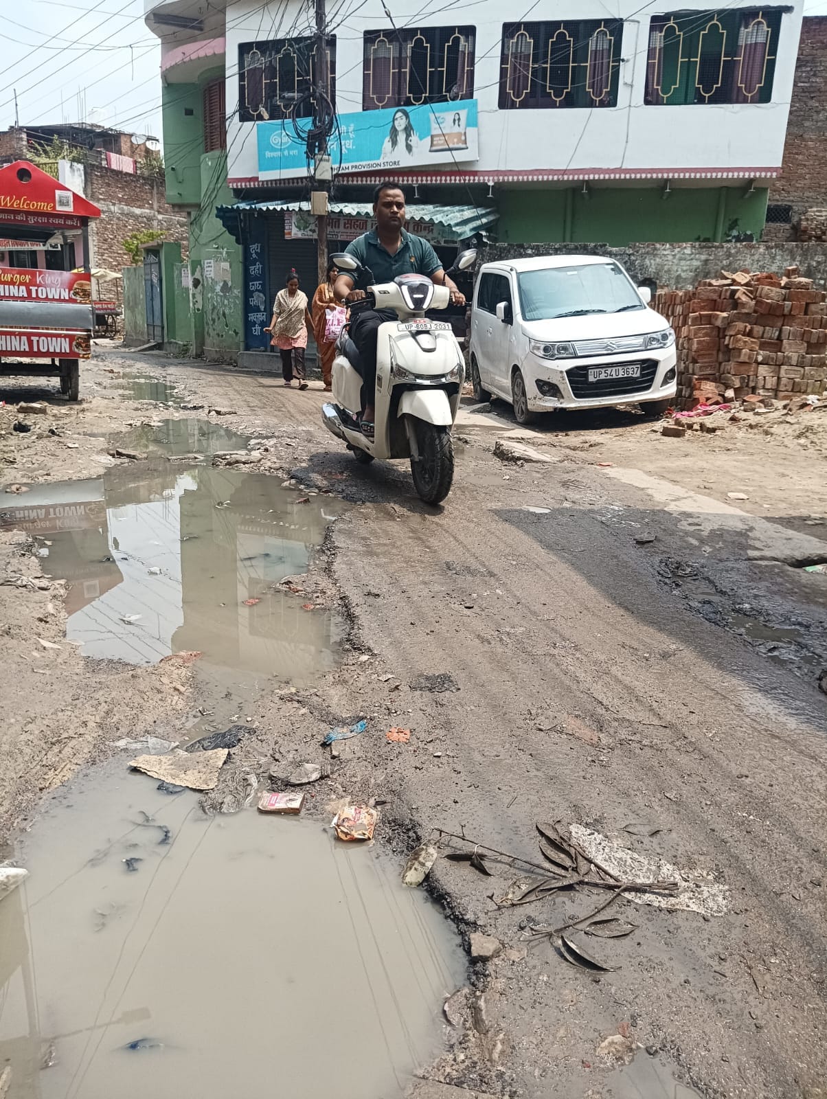 With the monsoon approaching, most city roads are in a dilapidated state, making traffic movement difficult.