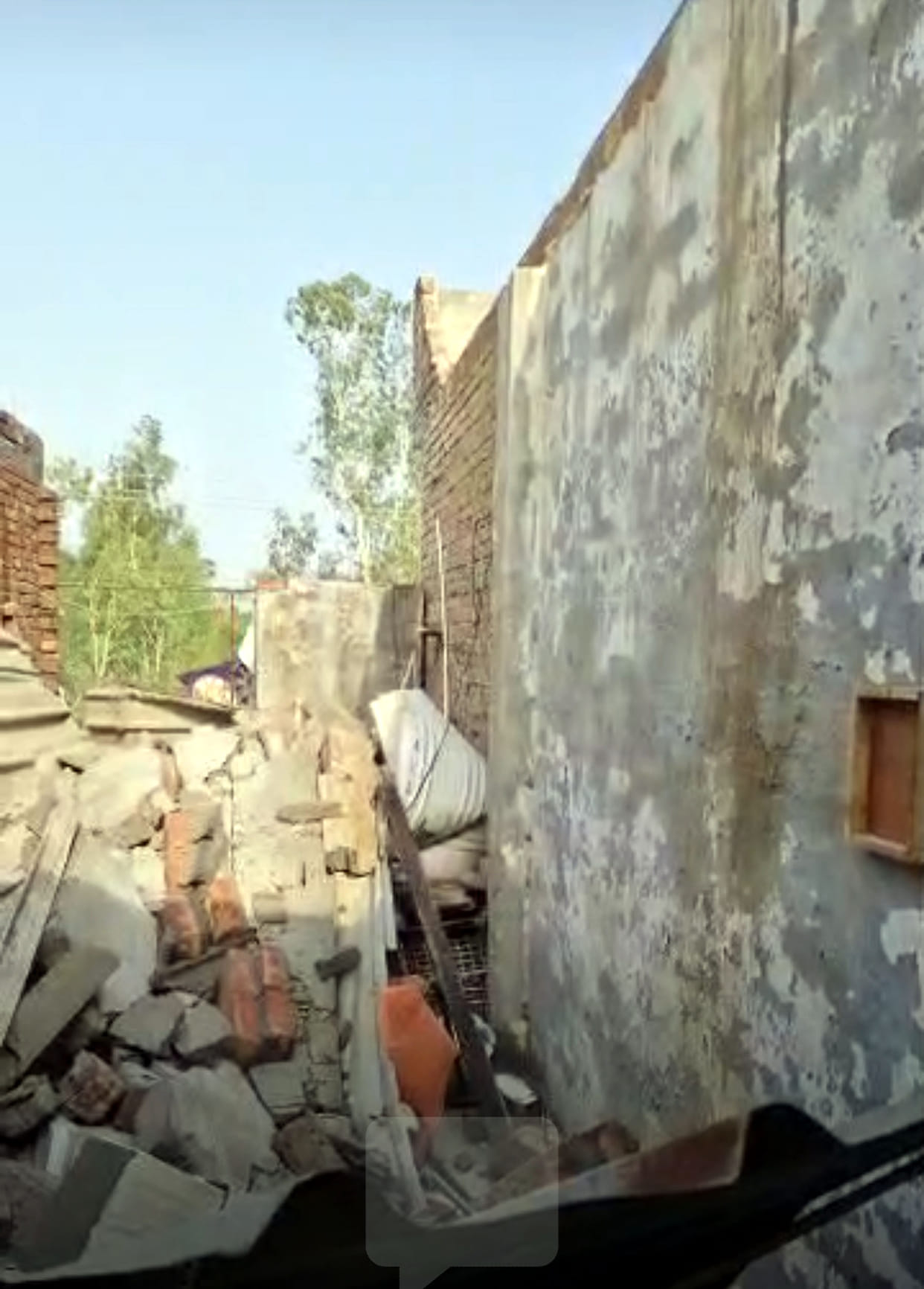 Walls, solar panels, and shop signs were blown away in Kalayat.