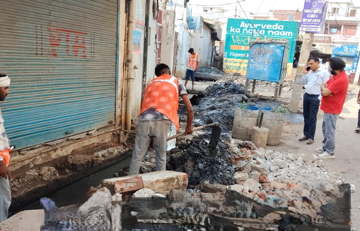 Sledgehammer used on the covered drain in Devi Bhavan Market