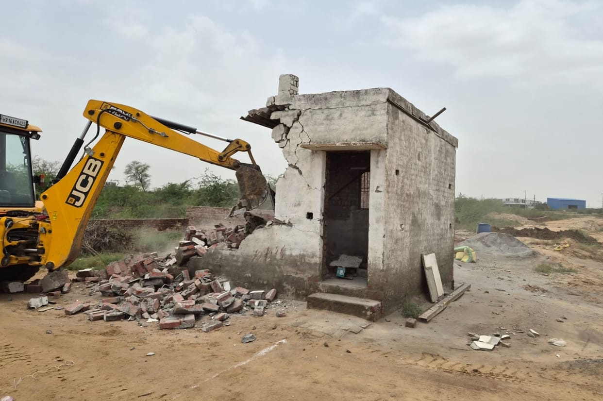 The District Town Planner used a bulldozer to demolish an illegal colony being developed on four acres of land.
