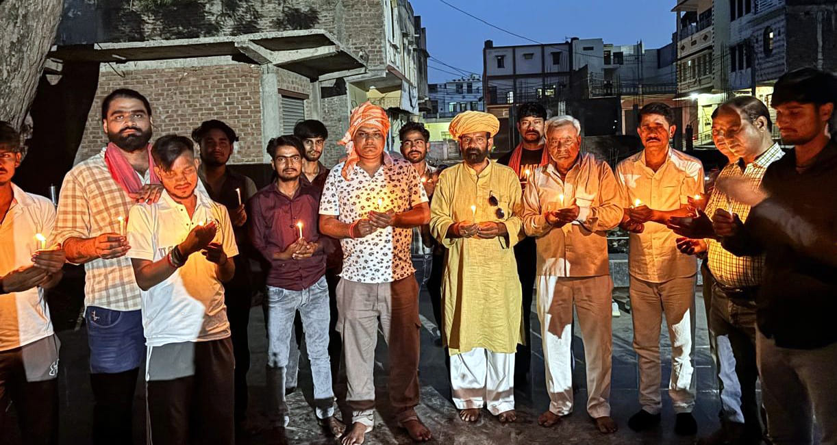 'Angry Youth' hold candle march over the deaths of three Indian sailors.