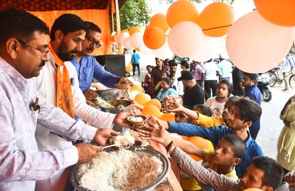 Devotees partook of the prasad at the community feast.