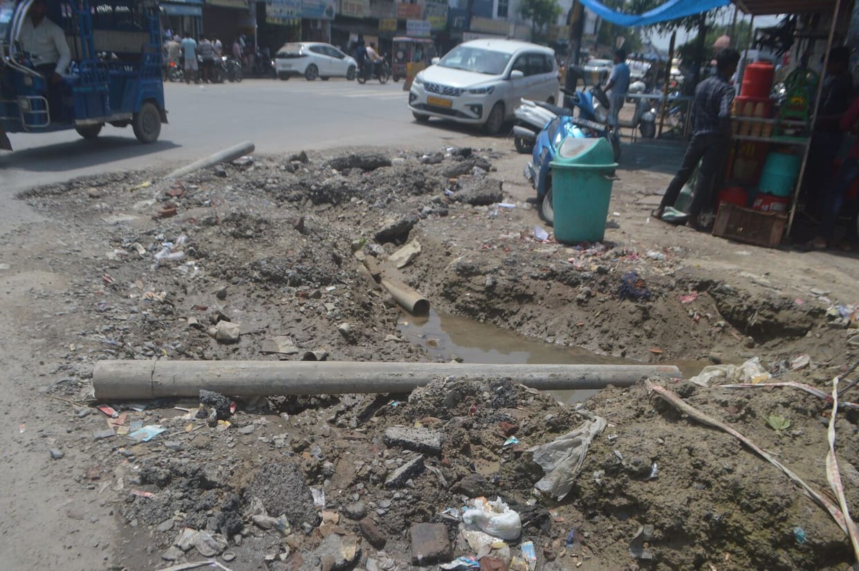 Pits dug in the city for pipeline inspections cause inconvenience to pedestrians.