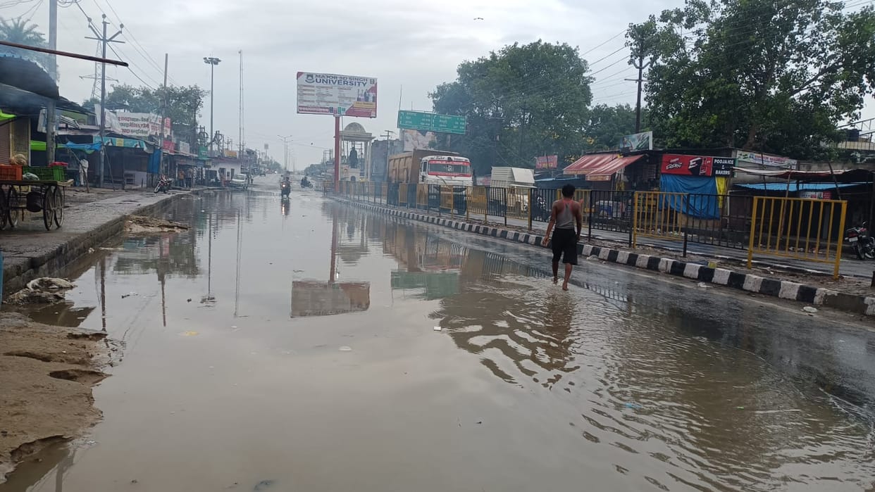 Drains overflow due to heavy downpour; highways and streets inundated.