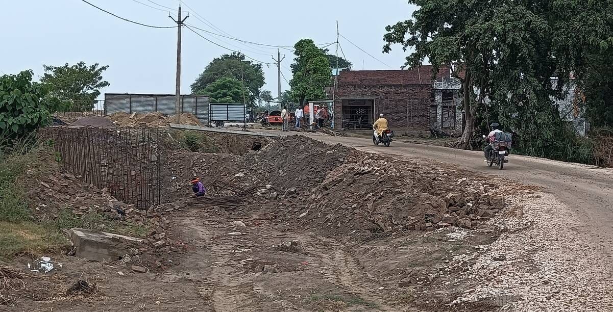The contractor has now filled in the drain and constructed a diversion route