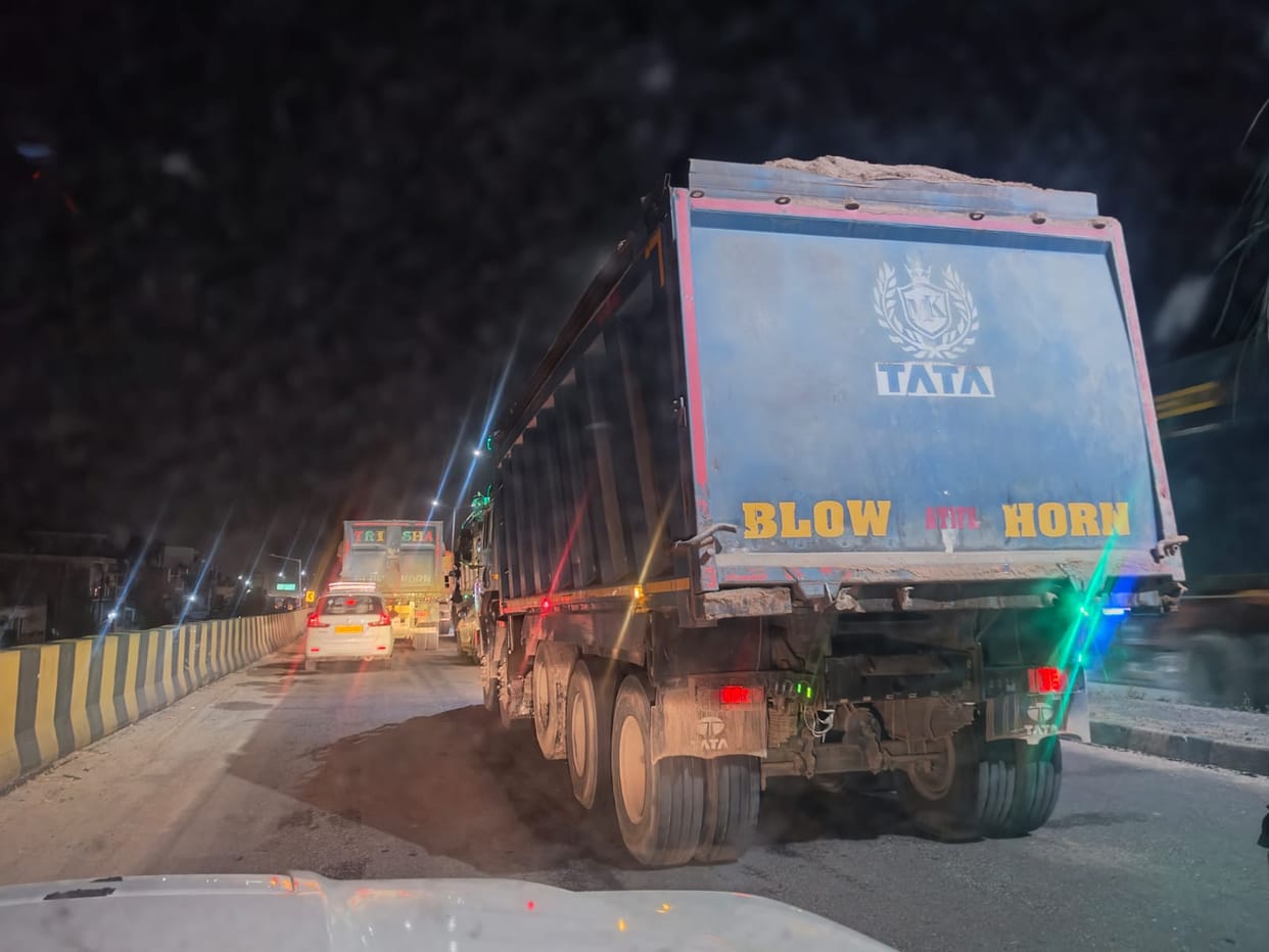 Traffic slows down again on the old Yamuna bridge; many vehicles stuck in a four-hour jam.