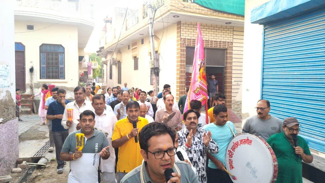 Chants of 'Radha Rani' echoed during the morning procession.