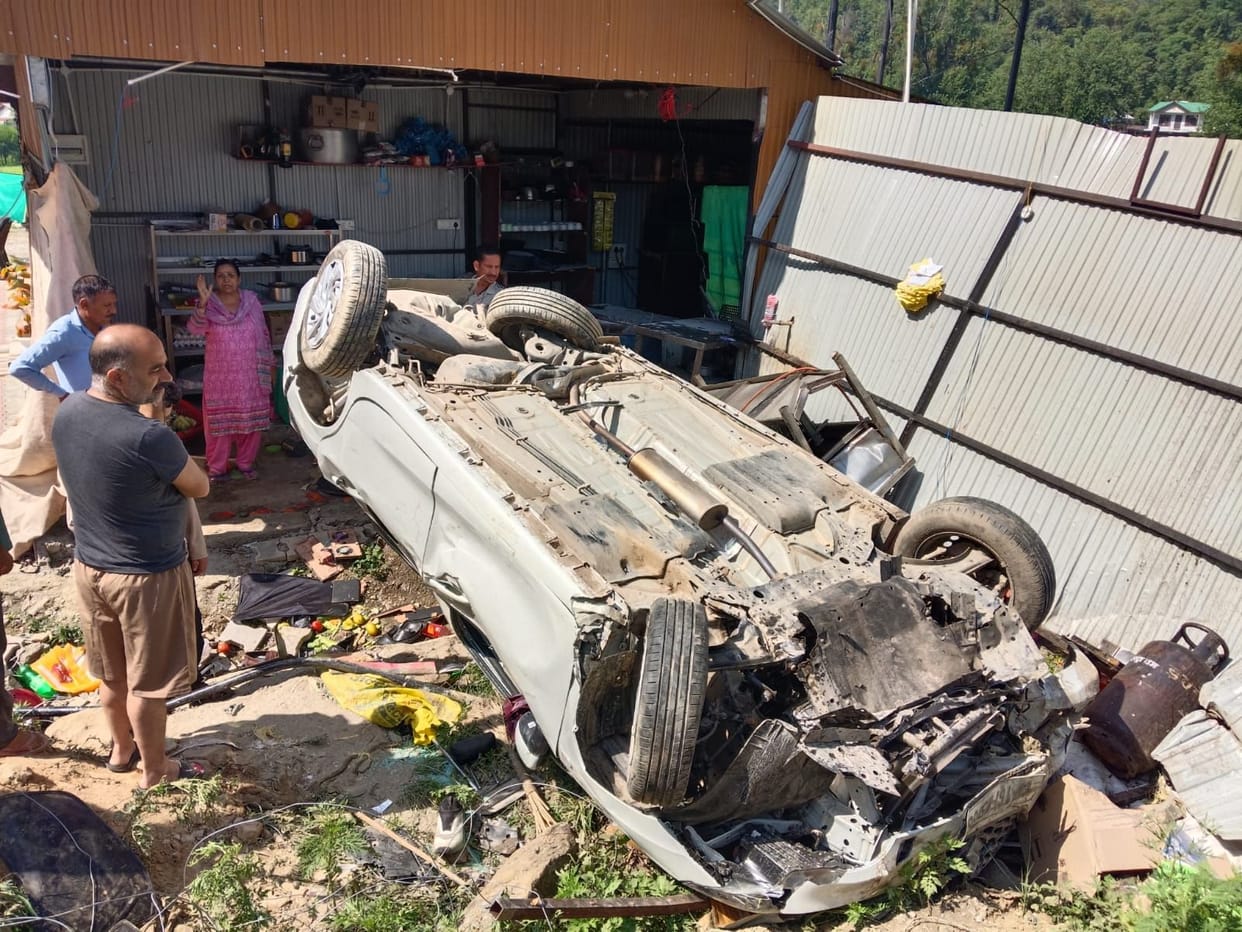 Speeding car crashes into roadside eatery on four-lane highway; five tourists from UP injured.