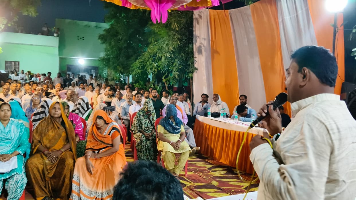 Heard villagers' grievances and provided information about schemes during the night-time community meeting.