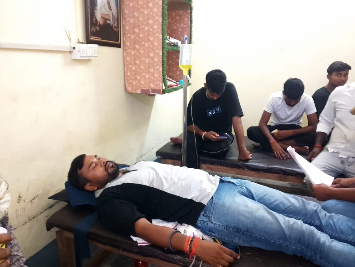 Electric current leaks into water cooler; youth suffers burns after coming into contact.