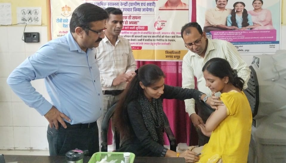Adolescent girls receive cervical cancer prevention vaccines at health fairs.