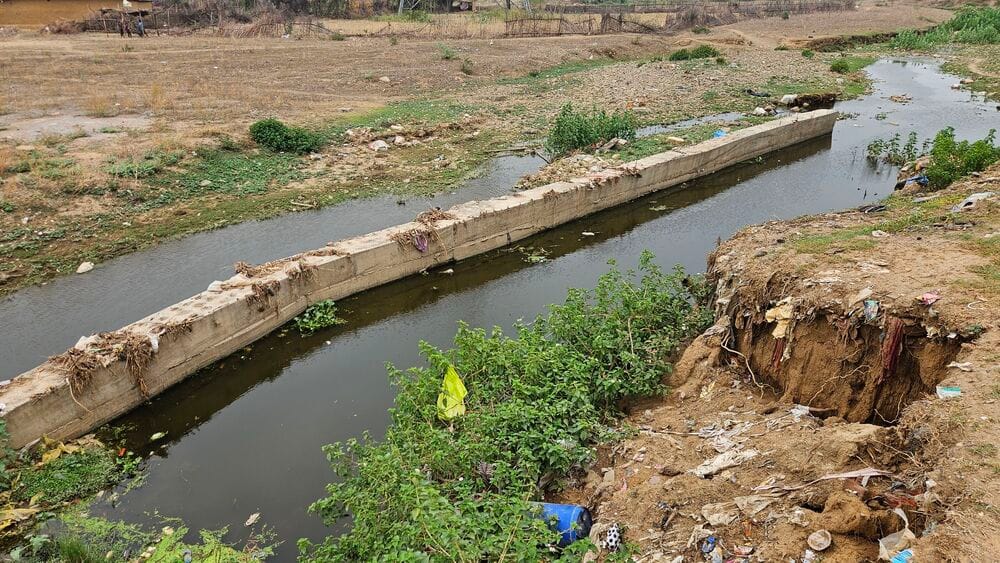 Despite a budget of 3.8 million, the wall remains incomplete for two years, leaving villagers in distress in Dibulganj
