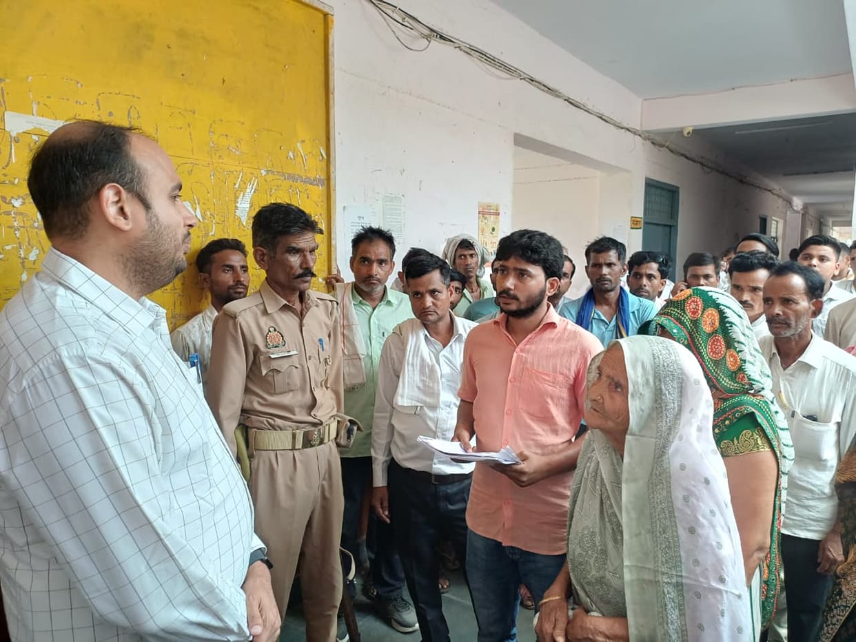 Villagers protest at the tehsil office against the encroachment of the road.