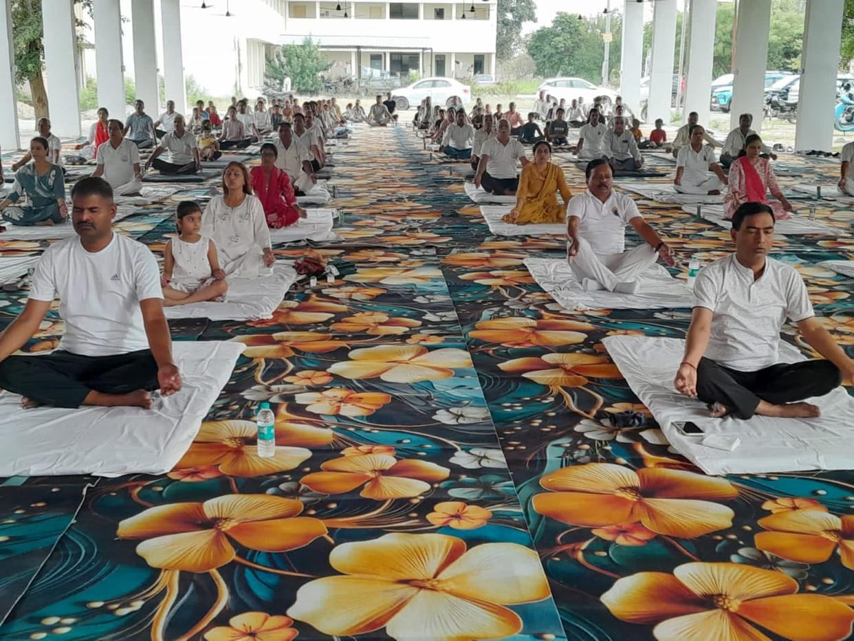 Yoga Week kicks off; 300 people practice.