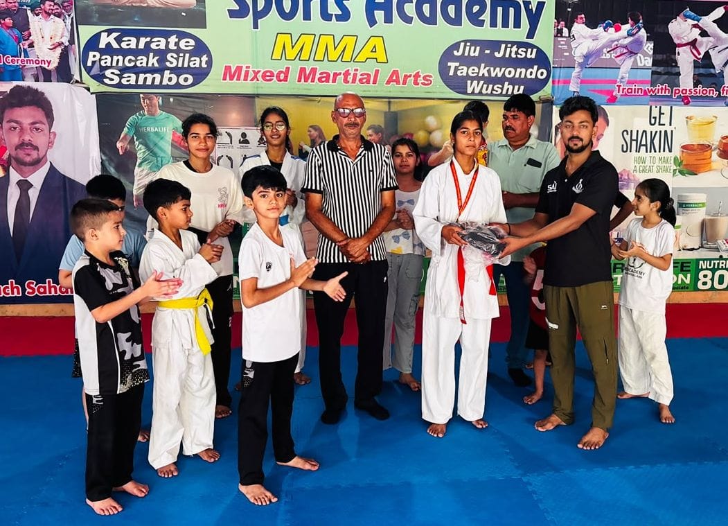 Medal winners honored at the state-level karate championship.