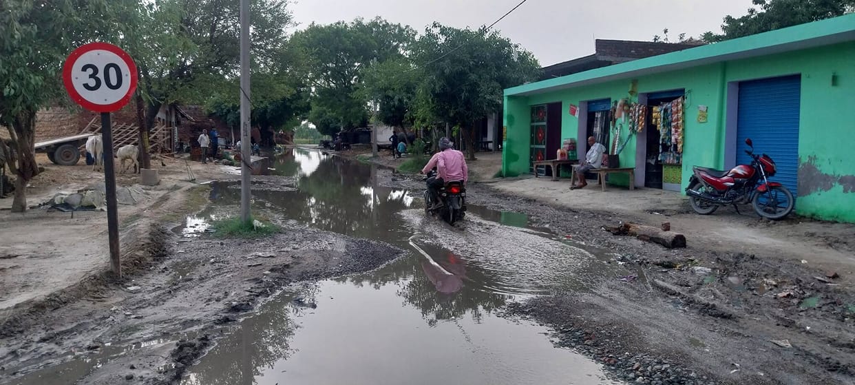 Potholes ranging from two to five feet deep on the Budaun-Meerut Highway.
