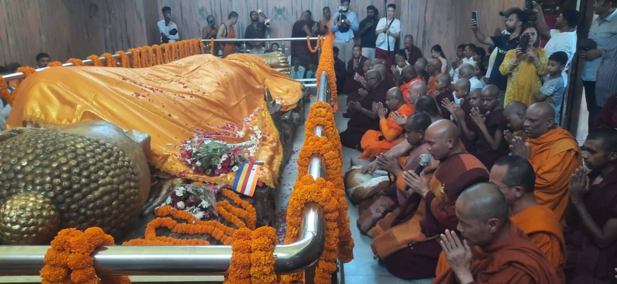 Foreign monks offer prayers at the site of Buddha's Mahaparinirvana
