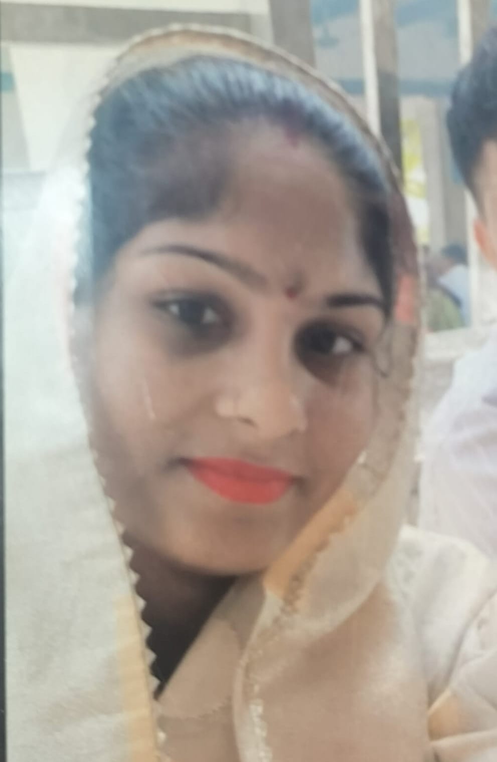 Married woman dies under suspicious circumstances; body found hanging from ceiling fan.