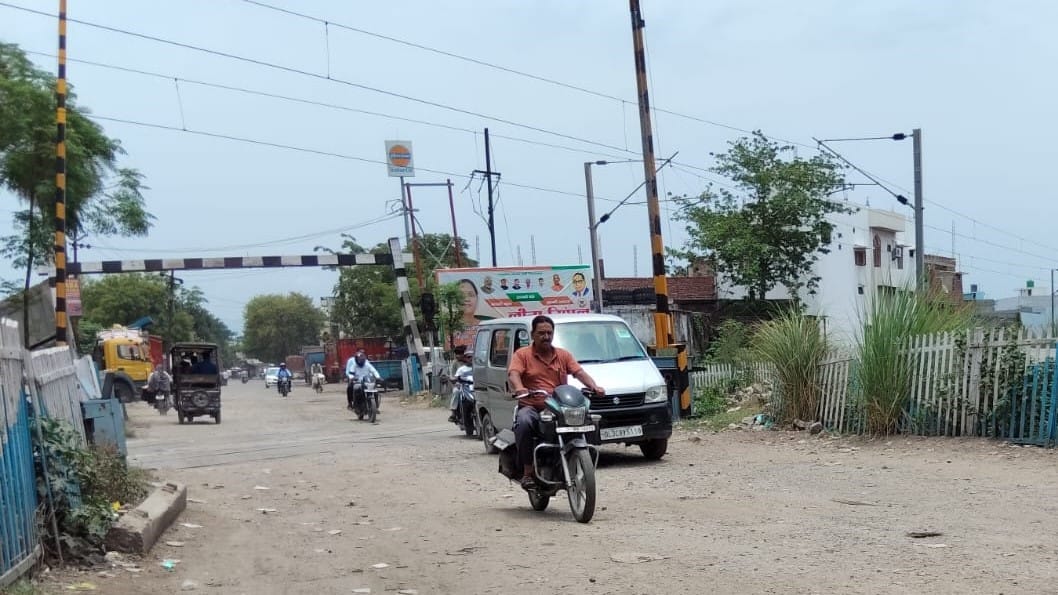 Road damaged between Pukar Talkies railway crossing