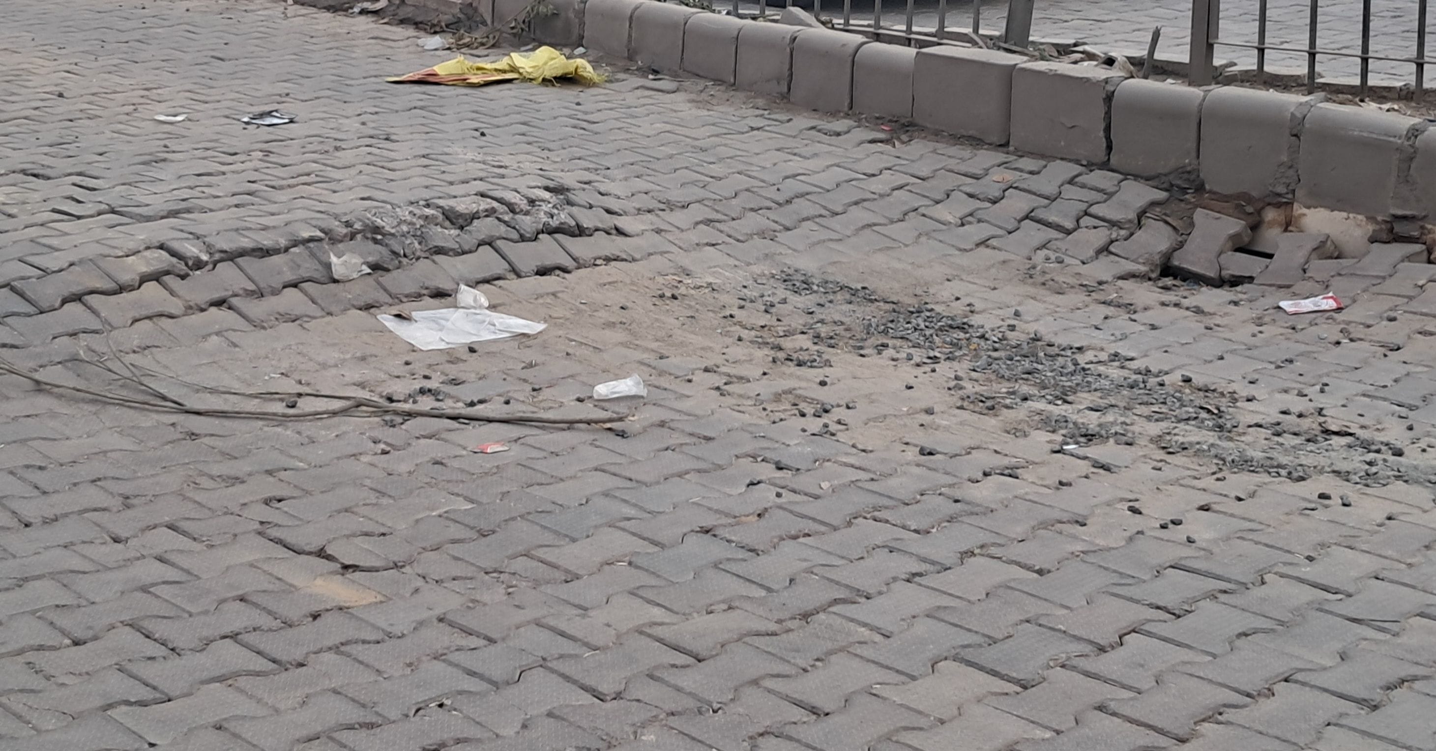 Road caves in again at Dinod Gate; potholes increase risk of accidents.