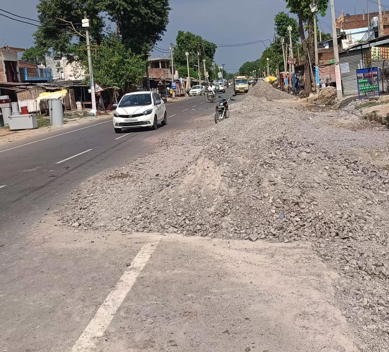 Contractor digs up road and forgets about it; accidents occurring.