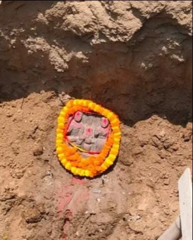 Idols of Shiva, Parvati, and Ganesha found during excavation.