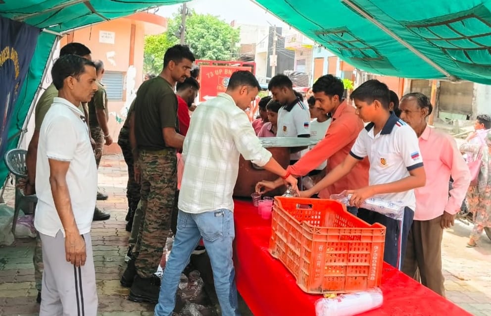 NCC cadets set up a refreshment stall.