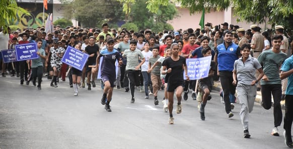 Enthusiasm seen among participants in the yoga marathon.