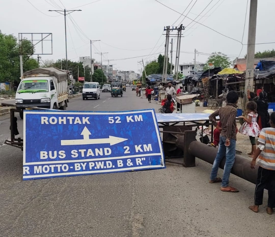 PWD signboard fell due to strong winds