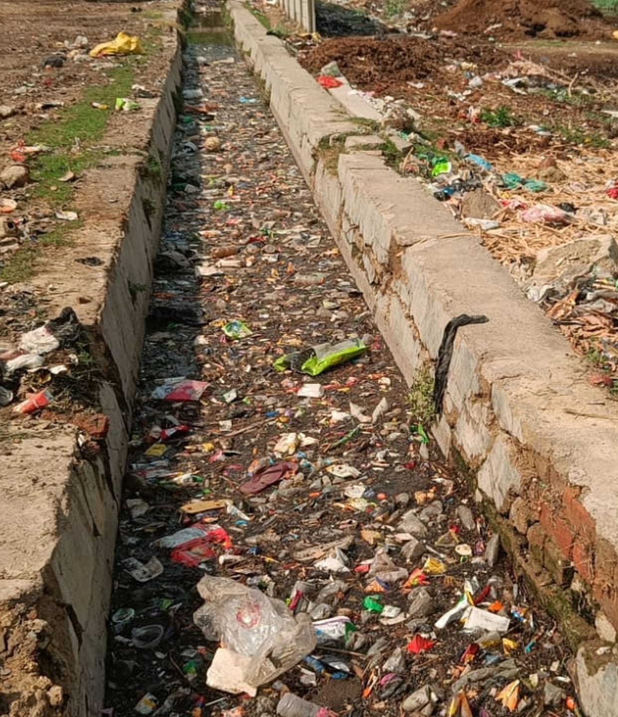 Drains choked with filth... roads will be submerged during the rains