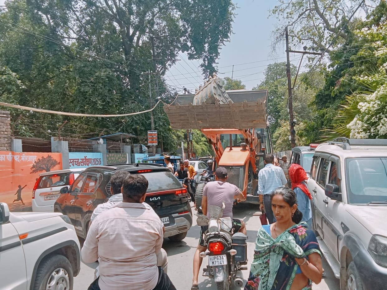 Traffic jam caused by JCB entering