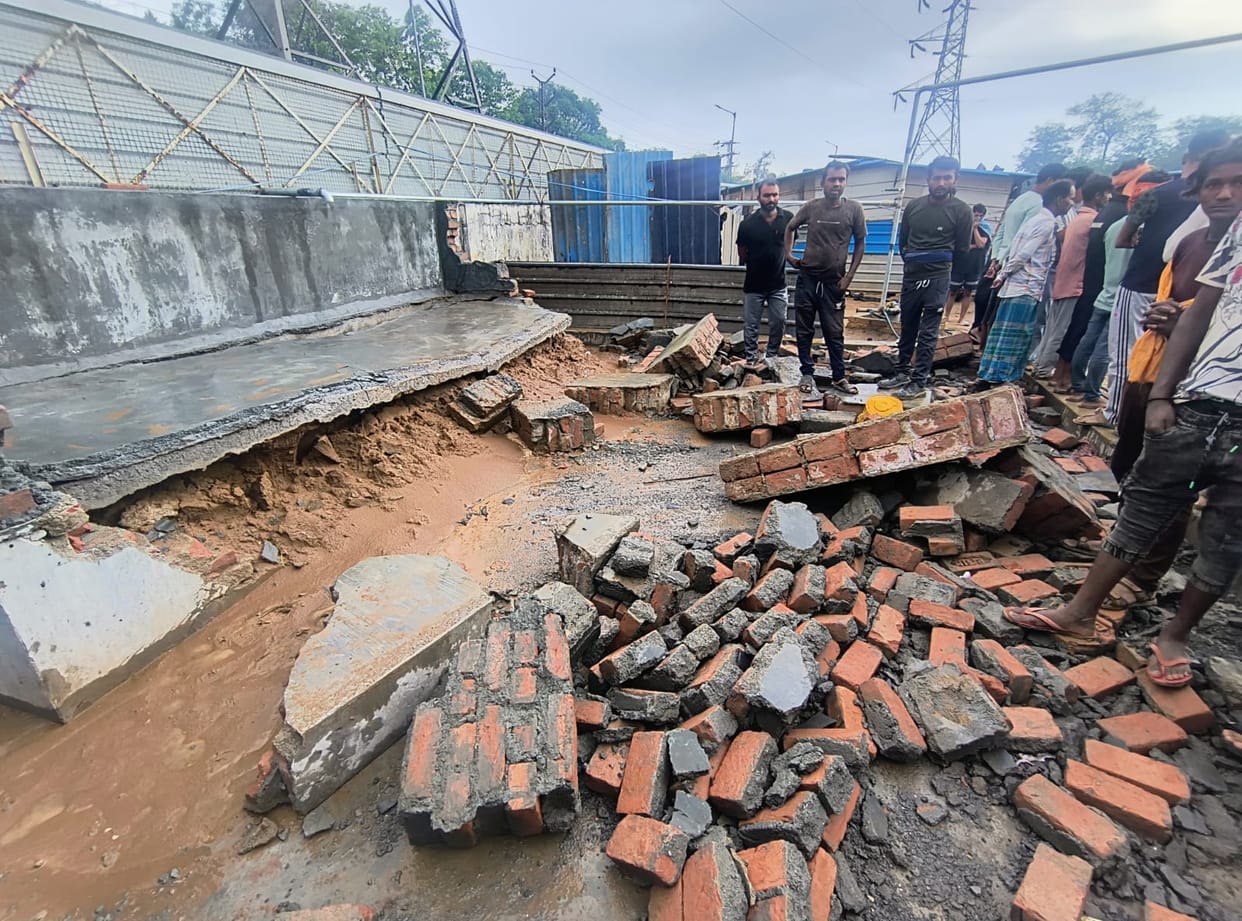 Tank wall collapses at under-construction plant; three children die.