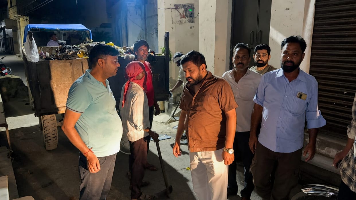 Due to the sanitation workers' strike, private workers were employed to collect garbage at night.