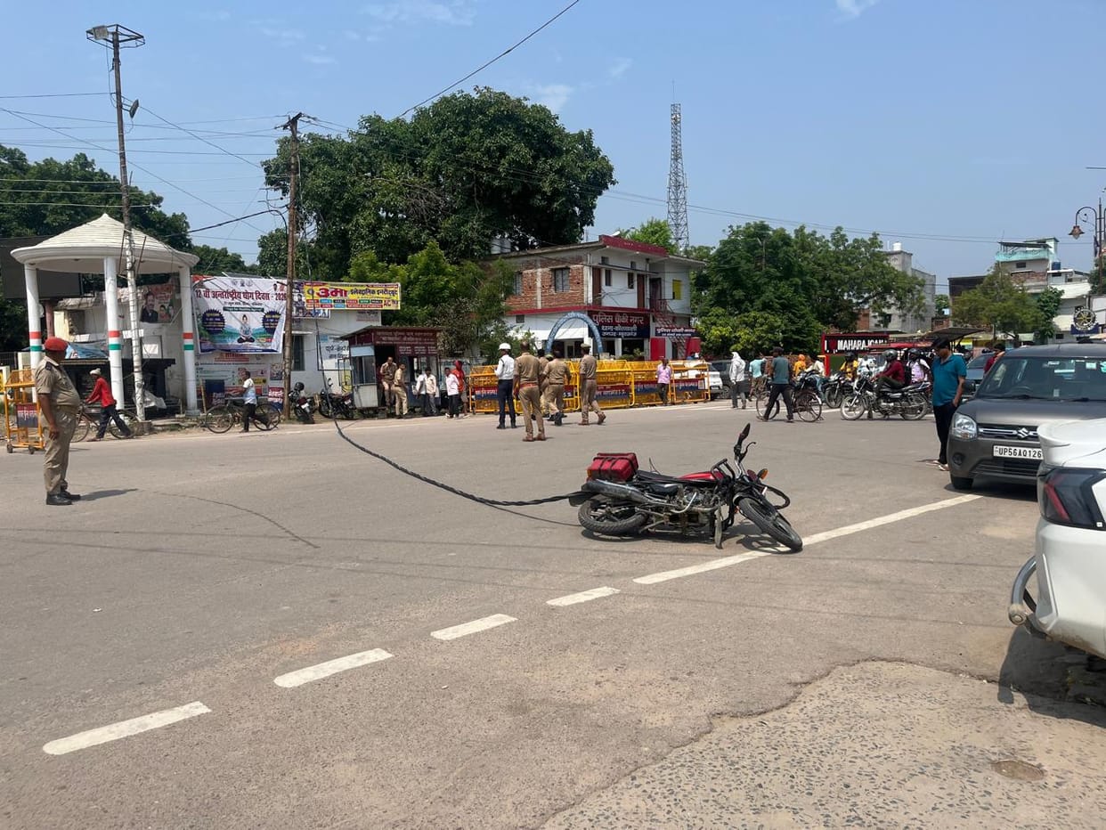 Power line falls on moving bike at Saxena Crossing.