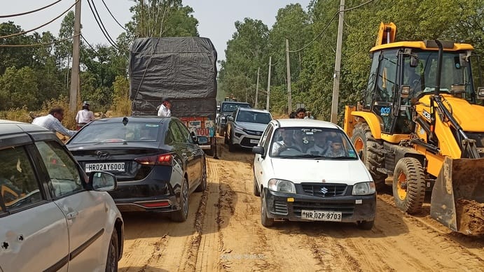 People are grappling with daily traffic jams due to the sluggish pace of state highway construction