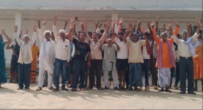 Villagers protest at the station, upset over the lack of passenger train halts.