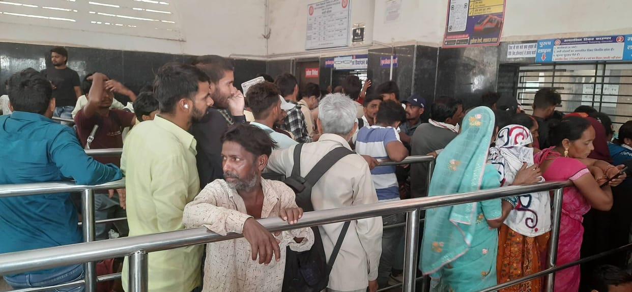 Endless waiting in the Tatkal queue... tickets run out by the time one's turn arrives.