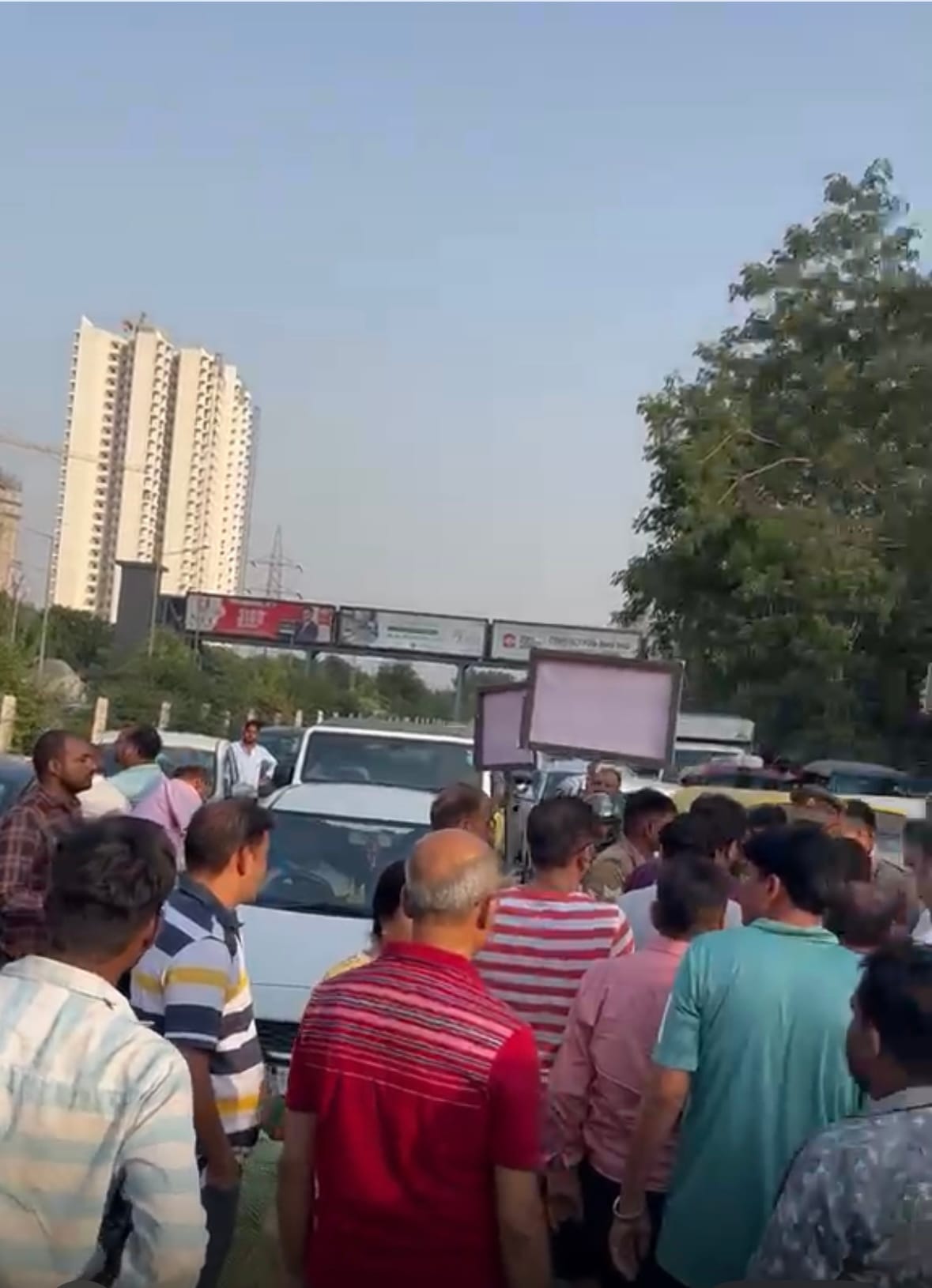 Eco Village-1 residents furious over meeting cancellation; stage a road blockade.