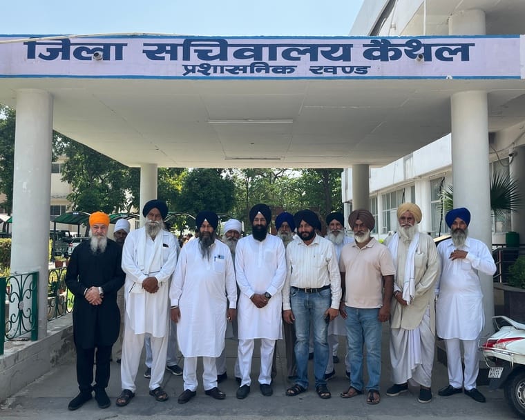 Sikh pilgrims express resentment as the group bound for Pakistan returns from the border.