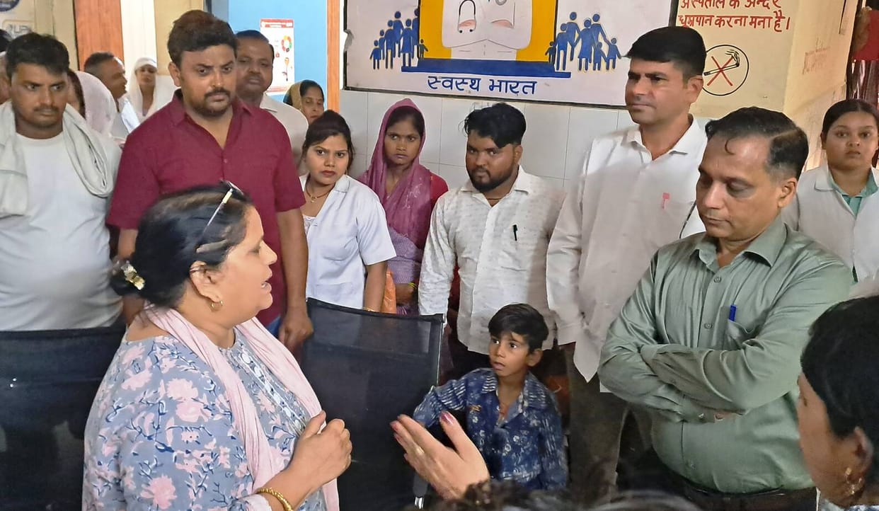 Female health visitor faints; in-charge accused of demanding one lakh rupees.