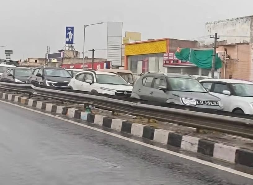 Vehicle speeds slowed down due to the rain.