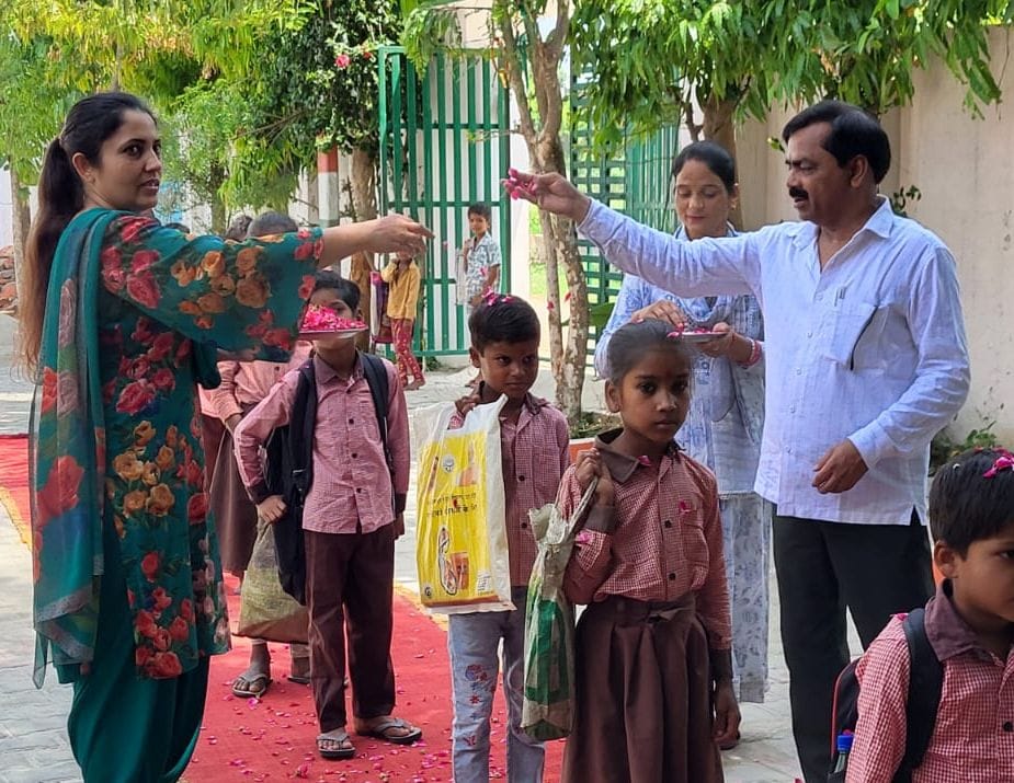 Tiny footsteps arrived at the school; they were welcomed with *tilak* and a shower of flowers.